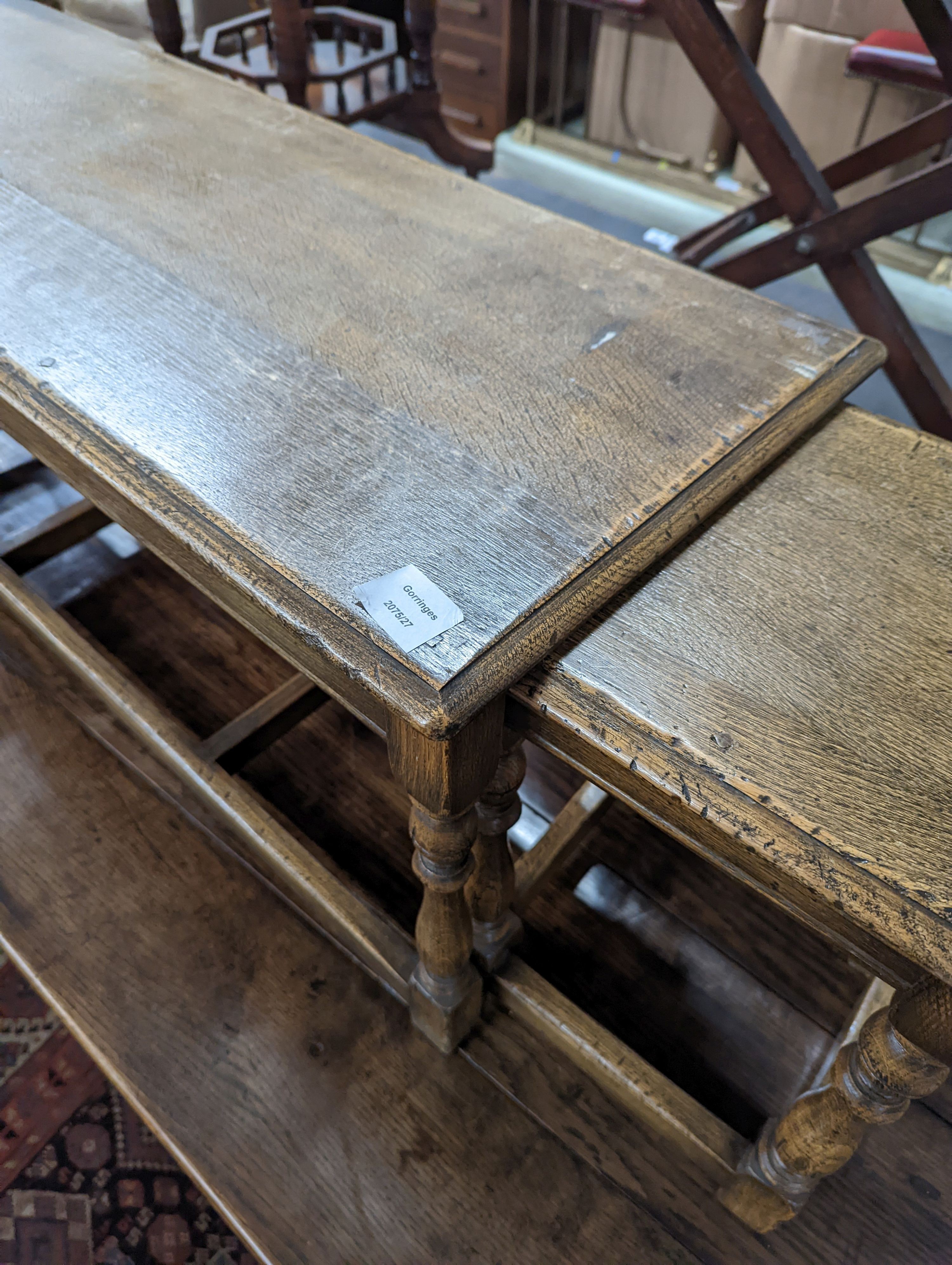 A nest of 18th century oak occasional tables, width 101cm, depth 38cm, height 46cm